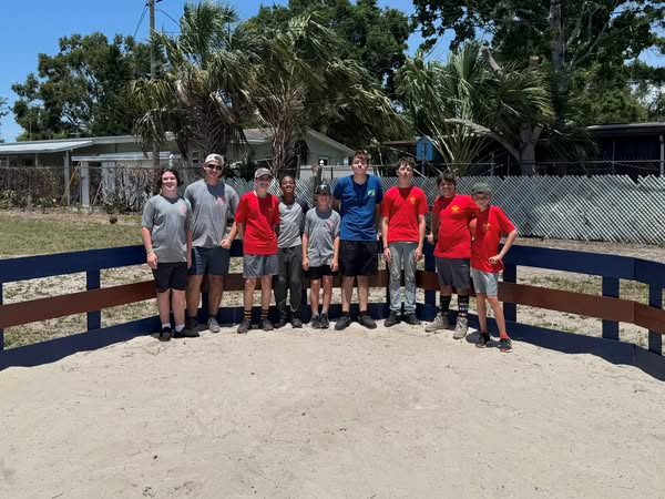 Scouts working together on the construction